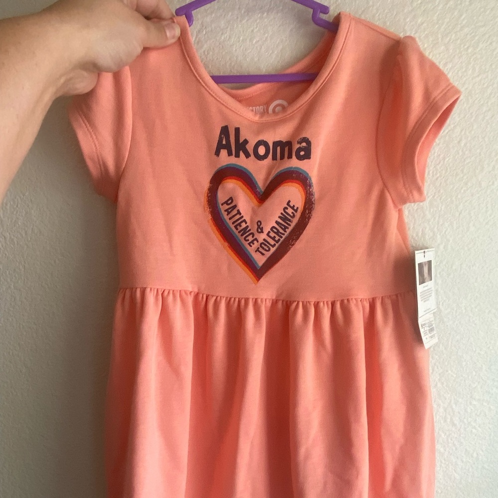 Black History Month Target exclusive baby dresses. Coral/peach color.